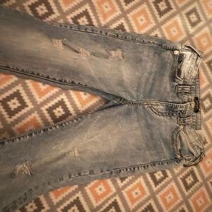 Distressed Blue Jeans